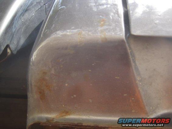 Rear fender rust on a vehicle
