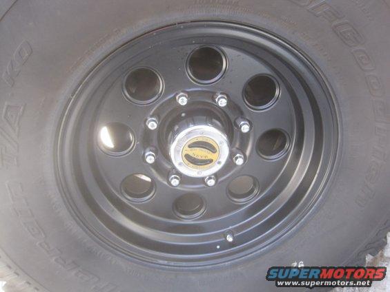 Close-up of a black wheel with a BFGoodrich tire and a Warn locking hub