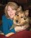 2012 Ford Focus - A woman and her dog share a moment together indoors.