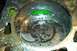 1993 Ford Taurus - Close-up view of an engine cylinder containing green coolant and oil, suggesting a head gasket issue.