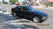 1999 BMW 5 Series - Black 1999 BMW 5 Series sedan parked curbside on a sunny day.