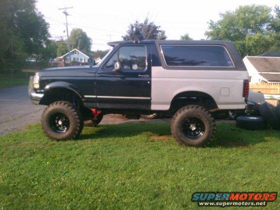 Lifted Ford Bronco, two-tone paint, big off-road tires