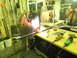 1990 Chevrolet Suburban - A person is welding a metal frame in a workshop, with various tools and equipment visible in the background.