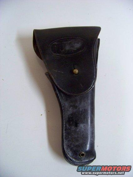 Leather holster with oval US marking and brass stud closure