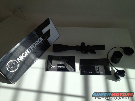 Nightforce rifle scope with box and accessories