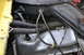 1978 Ford Bronco - Close-up view of engine components, including hoses and a valve cover, with a website URL visible in the lower right corner.