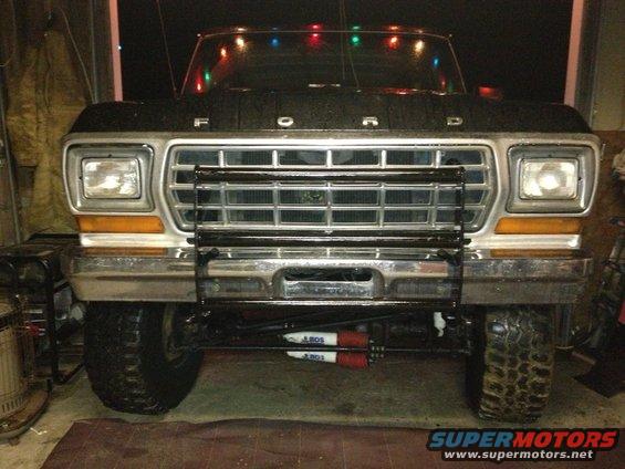 1979 Ford Bronco front view with bull bar and Christmas lights on windshield