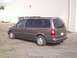 2005 Chevrolet Venture - Rear view of a 2005 Chevrolet Venture minivan parked outdoors.