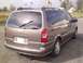 2005 Chevrolet Venture - Rear view of a tan 2005 Chevrolet Venture minivan parked outdoors.