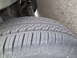 2005 Chevrolet Venture - Tire tread detail with visible suspension parts in the background.