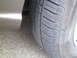 2005 Chevrolet Venture - A close-up view shows a tire and the lower portion of a vehicle's fender.