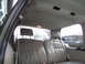 2005 Chevrolet Venture - View of the interior of a minivan, showing the rear seats and ceiling with air vents.