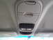 2005 Chevrolet Venture - Interior view of the overhead console in a 2005 Chevrolet Venture, storage compartments and multiple light switches.