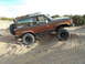1986 Ford Bronco II - This 1986 Ford Bronco II is equipped with large tires for off-road use on a sandy terrain.