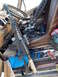 1986 Ford Bronco II - Firearms and gear are stored inside the vehicle's interior.