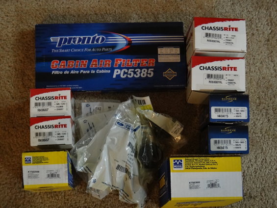 Assortment of auto parts including Pronto cabin air filter PC5385, Chassis-Rite parts, Supreme parts, and Moog parts