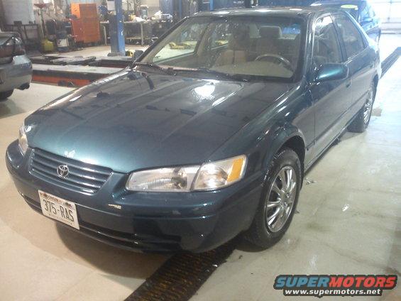 Dark teal 1998 Toyota Camry sedan, front quarter view. License plate 375-RAS