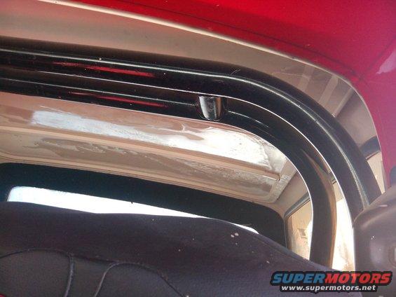 Interior roll bar and red exterior paint of a 1979 Ford Bronco