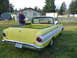 1961 Ford Ranchero - Pickup truck for sale, with "FOR SALE 300" on the rear window. Man stands next to it holding papers.
