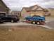 2012 Dodge Durango - A 2012 Dodge Durango is seen towing a blue Ford Mustang on a trailer.