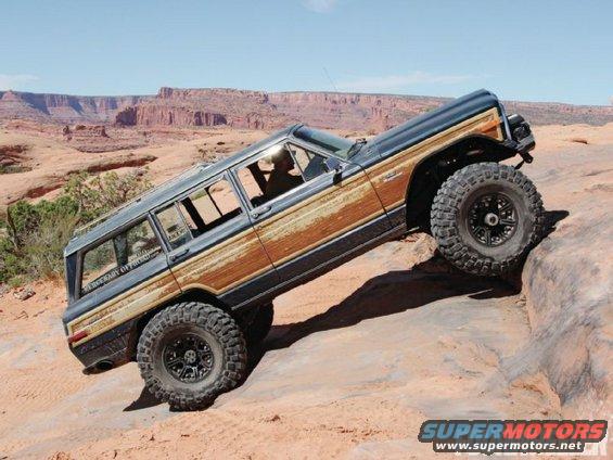 Jeep Grand Wagoneer climbing rocky terrain