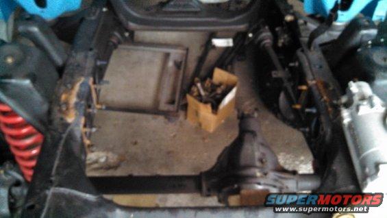 Vehicle frame with suspension components, differential, and a box of parts