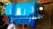 1977 Ford F-150 - A freshly painted blue engine oil pan is shown with a blue oil filter installed.