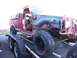 1987 Ford Ranger - This 1987 Ford Ranger is missing its front end and is being transported on a trailer.