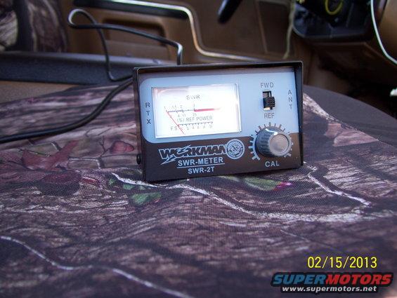 Workman SWR-2T meter on camouflage seat cover, with vehicle interior in background