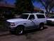 1994 Ford Bronco - White 1994 Ford Bronco parked on a residential street.
