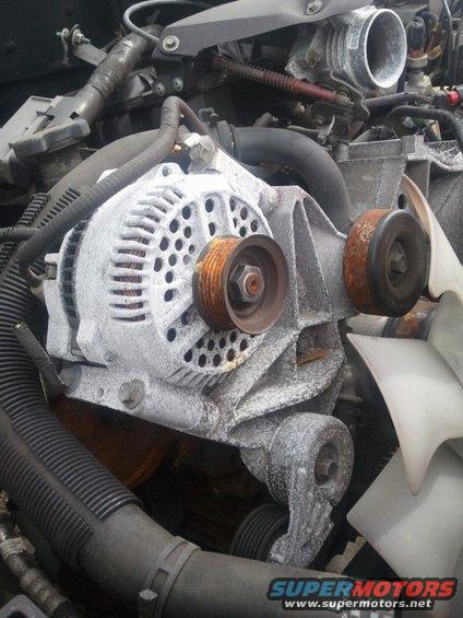 Engine alternator with rusty pulleys and fan blades