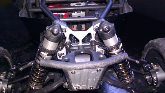 RC car front suspension with silver shocks and black springs