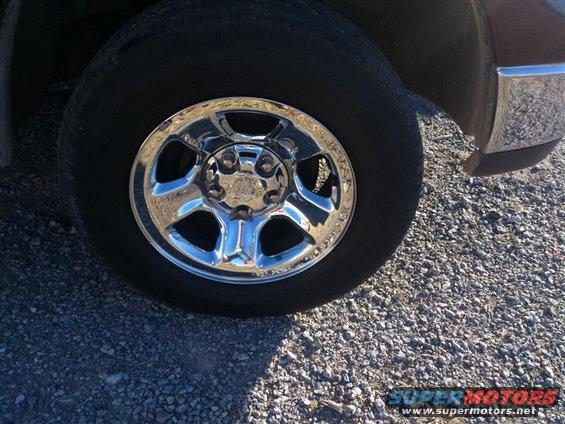 Close-up of a chrome wheel and tire on a truck