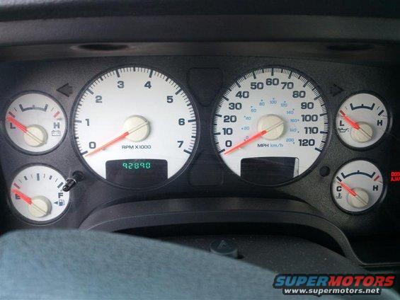 Dashboard gauges of a 2004 Dodge 1500 showing 92890 miles, speedometer, tachometer, oil pressure, and fuel level