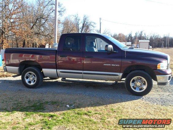 Maroon 2004 Dodge Ram 1500 pickup truck, side view