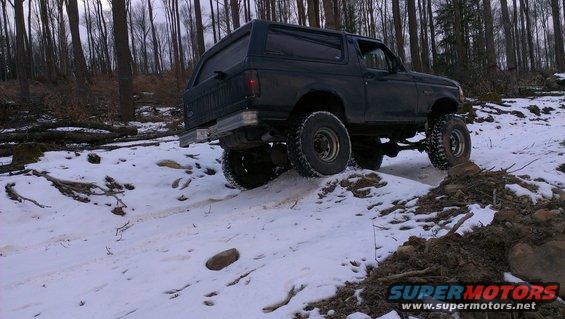 1995 Ford Bronco on snowy trail