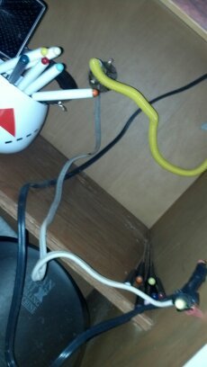 Wires and pens in a drawer