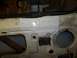 1990 Ford Bronco - Close-up of a vehicle's firewall undergoing repair work, with visible patching and metalwork.