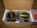 1990 Ford Bronco - Two Warn locking hubs are shown in their packaging, ready for installation on a vehicle.