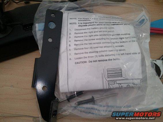 Black metal bracket and installation instructions with text and diagrams