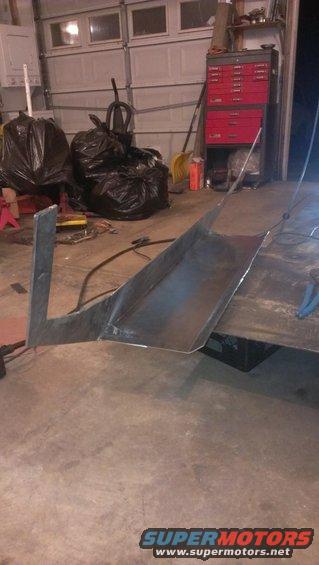 Metal ramp or channel being fabricated in a garage