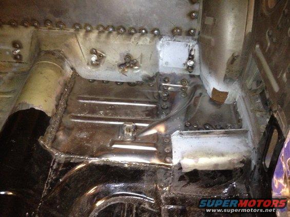 65 Mustang drivers side rear floor welded in