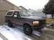 1992 Ford Bronco - 1992 Ford Bronco in a driveway with snow on the ground.