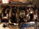 1989 Ford Bronco - Close-up view of an engine's internal components, showing the crankshaft and connecting rods.