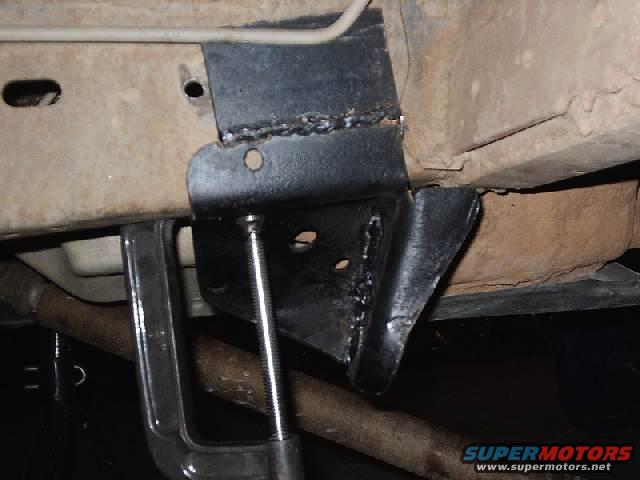Held on with a c-clamp, the bracket looks like it it good to get drilled