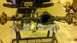 1996 Ford Bronco - A vehicle's differential axle assembly is shown disassembled on a workbench, with tools and cleaning supplies present.