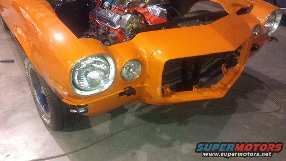 1973 Chevrolet Camaro front end, orange, with engine exposed