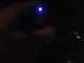 2003 Ford Crown Victoria - A blue light is visible in the dark interior of a vehicle.