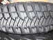 1992 Ford Bronco - A close-up view of a tire's tread pattern is shown, with no vehicle visible.
