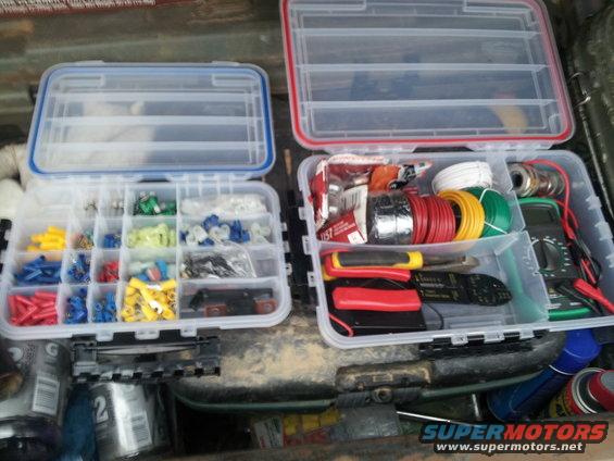 Tackle boxes with electrical supplies, wire, and tools